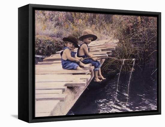 Two Boys Fishing Off of Bridge-Nora Hernandez-Framed Premier Image Canvas