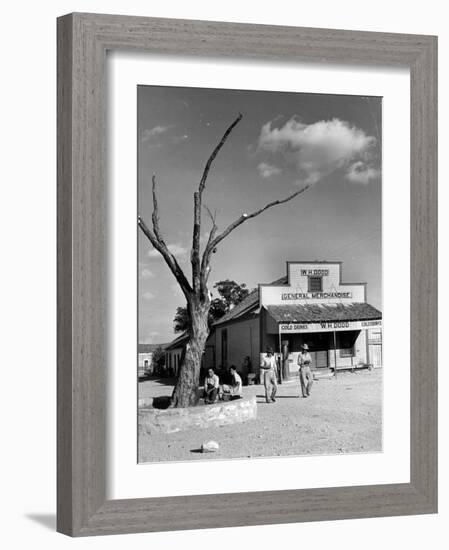 Two Boys Playing Nr. a Dead Tree as Judge Roy Langrty and a Man Walk Past a General Store-Alfred Eisenstaedt-Framed Photographic Print