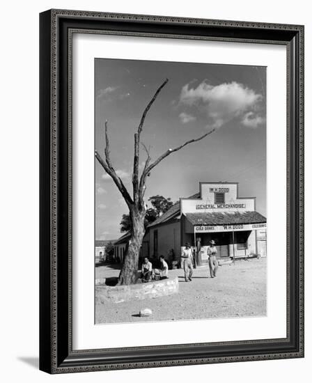 Two Boys Playing Nr. a Dead Tree as Judge Roy Langrty and a Man Walk Past a General Store-Alfred Eisenstaedt-Framed Photographic Print