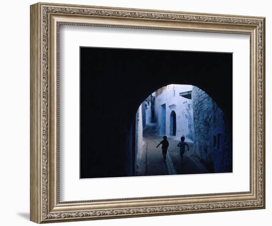 Two Boys Running Through Kasbah, Chefchaouen, Morocco-Jeffrey Becom-Framed Photographic Print