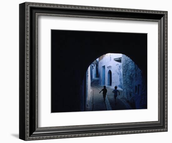 Two Boys Running Through Kasbah, Chefchaouen, Morocco-Jeffrey Becom-Framed Photographic Print