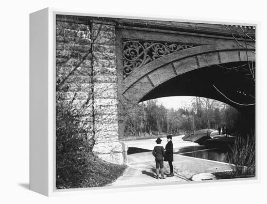 Two Boys Standing under the Ornate Arch of a Bridge in Prospect Park, Brooklyn, Ny-Wallace G^ Levison-Framed Premier Image Canvas