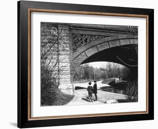 Two Boys Standing under the Ornate Arch of a Bridge in Prospect Park, Brooklyn, Ny-Wallace G^ Levison-Framed Photographic Print