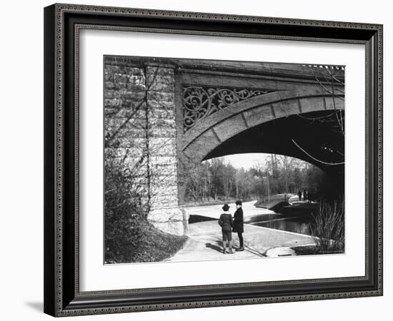 Two Boys Standing under the Ornate Arch of a Bridge in Prospect Park, Brooklyn, Ny-Wallace G^ Levison-Framed Photographic Print