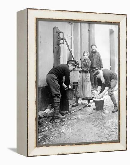 Two British Soldiers Having a Wash by a Water Pump C.1914-18-null-Framed Premier Image Canvas