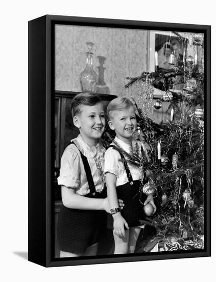 Two Brothers Look at a Christmas Tree in their Living Room in Germany, Ca. 1949-null-Framed Premier Image Canvas