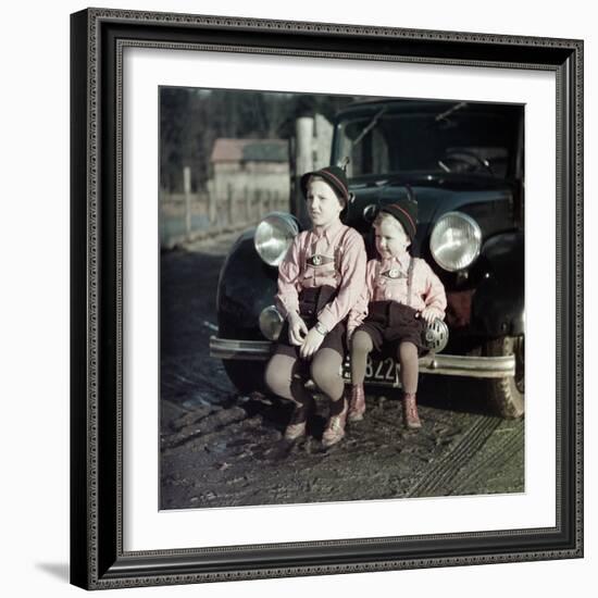 Two Brothers Sit on the Bumper of the Family Mercedes Benz in Germany, Ca. 1949-null-Framed Photographic Print