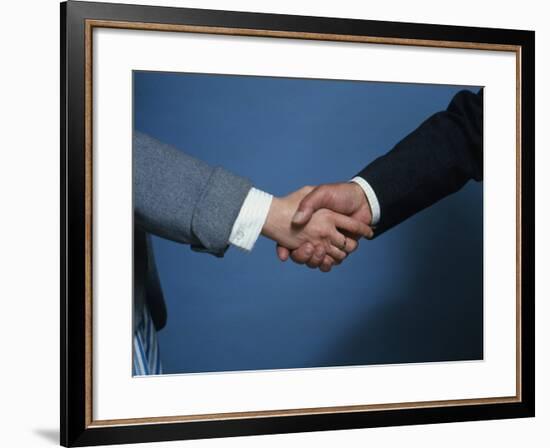 Two Businessmen Shake Hands-null-Framed Photographic Print