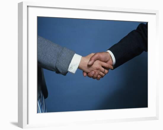 Two Businessmen Shake Hands-null-Framed Photographic Print