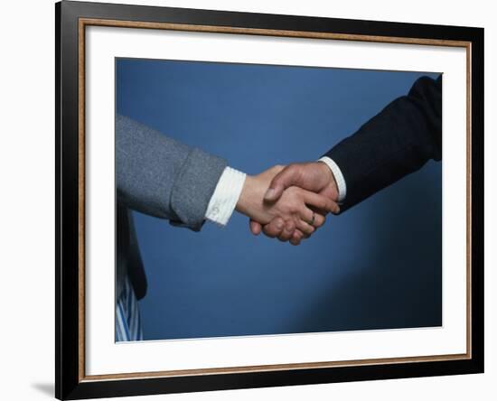 Two Businessmen Shake Hands-null-Framed Photographic Print