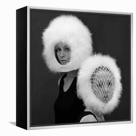 Two Capsule Line Feathered Helmets, 1960s-John French-Framed Premier Image Canvas
