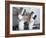 Two Chefs Having Discussion with Large Pans on their Heads-Robert Kneschke-Framed Photographic Print