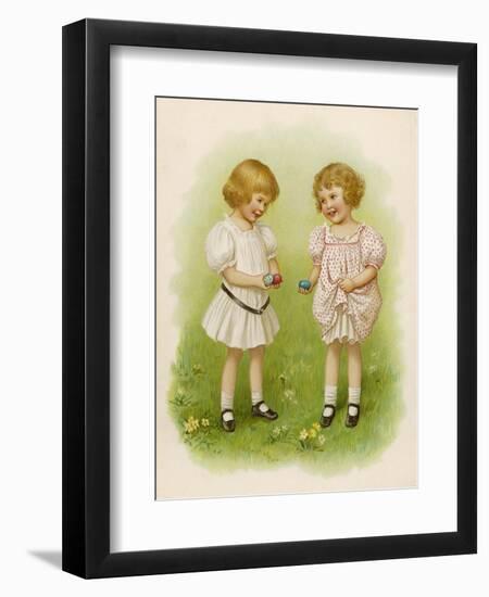 Two Children Compare Their Eggs on the Grass-Ida Waugh-Framed Art Print