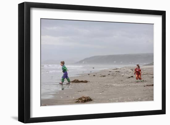 Two Children Playing on a Beach-Clive Nolan-Framed Photographic Print