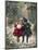 Two Children Sitting on a Swing in a Snowy Landscape-null-Mounted Photographic Print