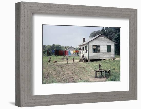 Two Children Stand in a Yard under a Laundry Line, Edisto Island, South Carolina, 1956-Walter Sanders-Framed Photographic Print