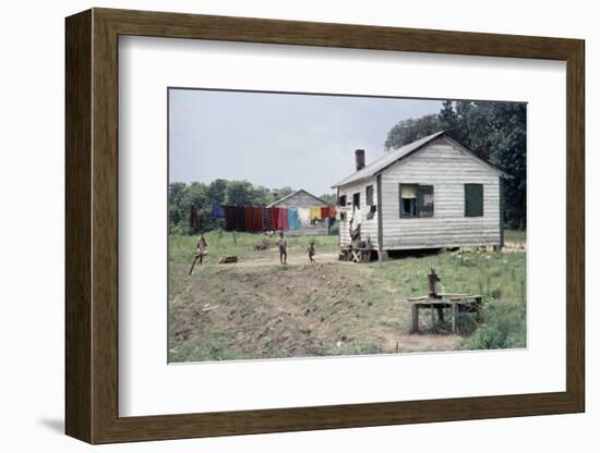 Two Children Stand in a Yard under a Laundry Line, Edisto Island, South Carolina, 1956-Walter Sanders-Framed Photographic Print