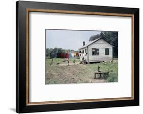 Two Children Stand in a Yard under a Laundry Line, Edisto Island, South Carolina, 1956-Walter Sanders-Framed Photographic Print