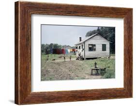 Two Children Stand in a Yard under a Laundry Line, Edisto Island, South Carolina, 1956-Walter Sanders-Framed Photographic Print