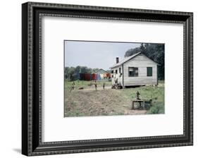 Two Children Stand in a Yard under a Laundry Line, Edisto Island, South Carolina, 1956-Walter Sanders-Framed Photographic Print