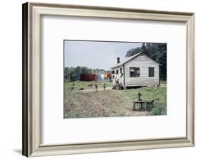 Two Children Stand in a Yard under a Laundry Line, Edisto Island, South Carolina, 1956-Walter Sanders-Framed Photographic Print