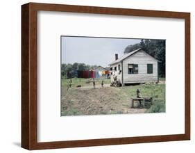 Two Children Stand in a Yard under a Laundry Line, Edisto Island, South Carolina, 1956-Walter Sanders-Framed Photographic Print