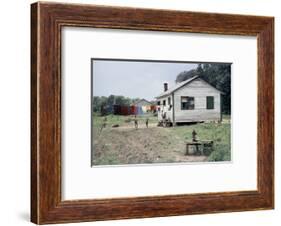 Two Children Stand in a Yard under a Laundry Line, Edisto Island, South Carolina, 1956-Walter Sanders-Framed Photographic Print
