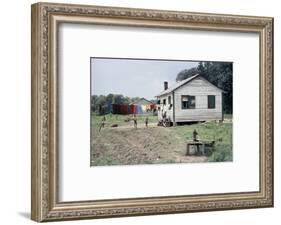 Two Children Stand in a Yard under a Laundry Line, Edisto Island, South Carolina, 1956-Walter Sanders-Framed Photographic Print