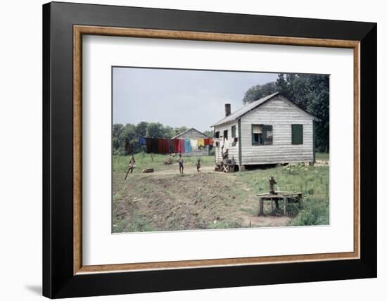 Two Children Stand in a Yard under a Laundry Line, Edisto Island, South Carolina, 1956-Walter Sanders-Framed Photographic Print