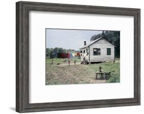 Two Children Stand in a Yard under a Laundry Line, Edisto Island, South Carolina, 1956-Walter Sanders-Framed Photographic Print