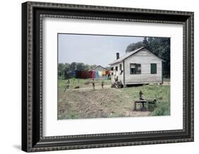 Two Children Stand in a Yard under a Laundry Line, Edisto Island, South Carolina, 1956-Walter Sanders-Framed Photographic Print