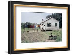 Two Children Stand in a Yard under a Laundry Line, Edisto Island, South Carolina, 1956-Walter Sanders-Framed Photographic Print