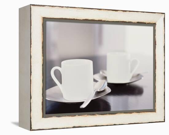 Two coffee cups on a table-null-Framed Premier Image Canvas