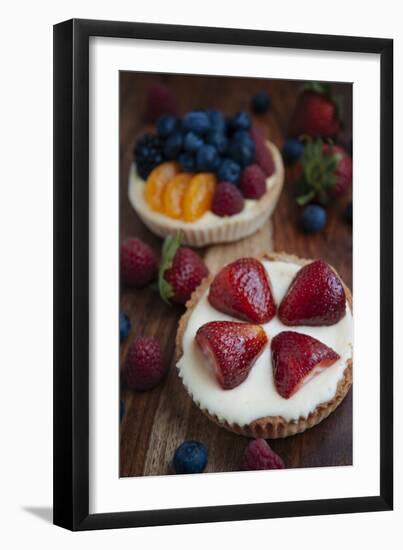 Two Custard Fruit Tarts With Strawberries, Blueberries, Raspberries And Mandarin Oranges In Custard-Shea Evans-Framed Photographic Print