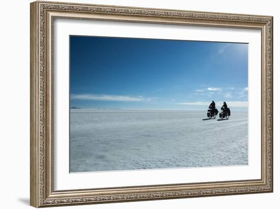 Two Cyclists Cycle in the Morning over the Salar De Uyuni-Alex Saberi-Framed Photographic Print