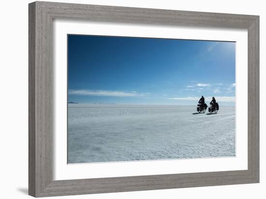 Two Cyclists Cycle in the Morning over the Salar De Uyuni-Alex Saberi-Framed Photographic Print