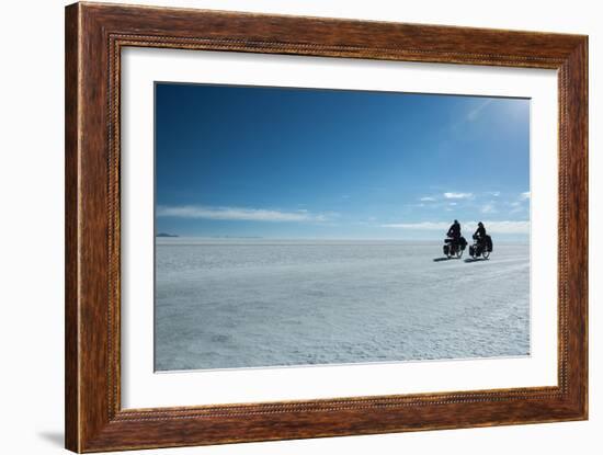 Two Cyclists Cycle in the Morning over the Salar De Uyuni-Alex Saberi-Framed Photographic Print
