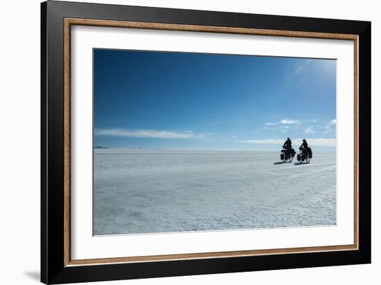 Two Cyclists Cycle in the Morning over the Salar De Uyuni-Alex Saberi-Framed Photographic Print