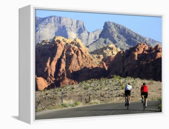 Two Cyclists, Red Rock Canyon National Conservation Area, Nevada, May 6, 2006-Jae C. Hong-Framed Premier Image Canvas