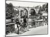 Two Cyclists Take a Break on a Bridge Over the River Nidd at Knaresborough-Fred Musto-Mounted Photographic Print