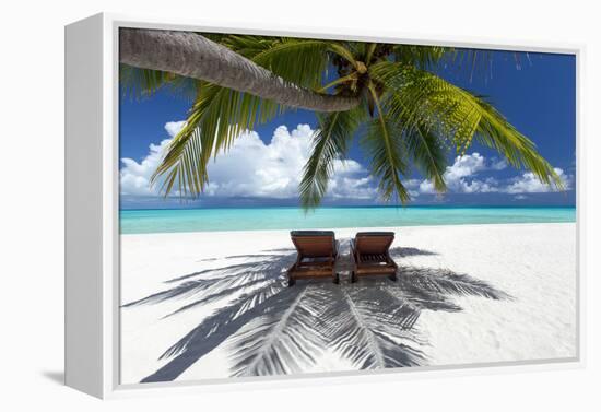 Two deck chairs under palm trees and tropical beach, The Maldives, Indian Ocean, Asia-Sakis Papadopoulos-Framed Premier Image Canvas