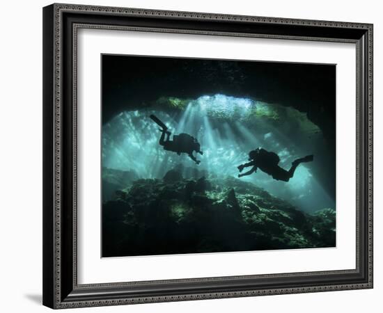 Two Divers Silhouetted in Light at Entrance to Chac Mool Cenote, Mexico-null-Framed Premium Photographic Print