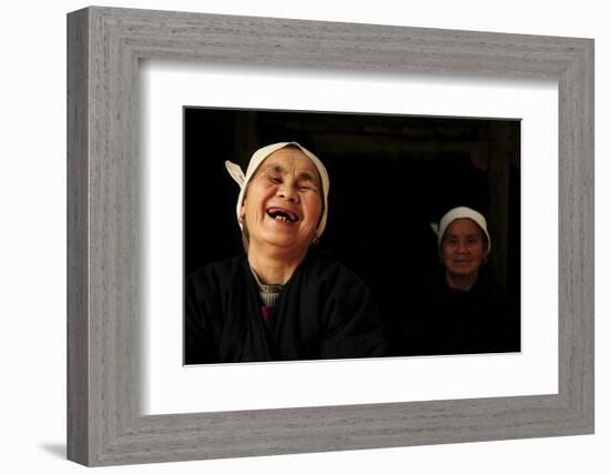 Two Dong Women, One Laughing, in a Dark Room, Sanjiang Dong Village, Guangxi, China-Enrique Lopez-Tapia-Framed Photographic Print