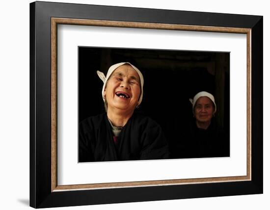 Two Dong Women, One Laughing, in a Dark Room, Sanjiang Dong Village, Guangxi, China-Enrique Lopez-Tapia-Framed Photographic Print