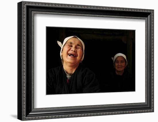 Two Dong Women, One Laughing, in a Dark Room, Sanjiang Dong Village, Guangxi, China-Enrique Lopez-Tapia-Framed Photographic Print