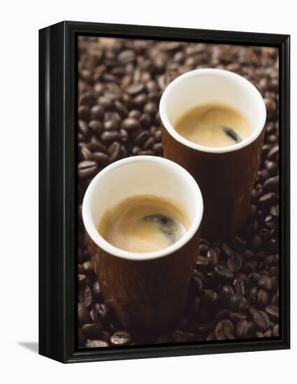 Two Espressos Standing on Coffee Beans-null-Framed Premier Image Canvas