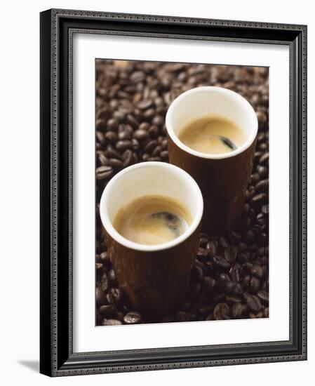 Two Espressos Standing on Coffee Beans-null-Framed Photographic Print