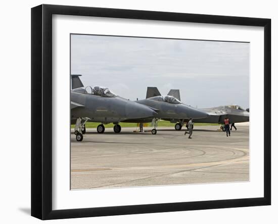 Two F-15's An An F-22 Raptor Parked On the Runway at Kadena Air Base, Japan-Stocktrek Images-Framed Photographic Print