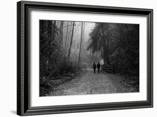 Two Figures Walking in Distance in Woodland-Sharon Wish-Framed Photographic Print