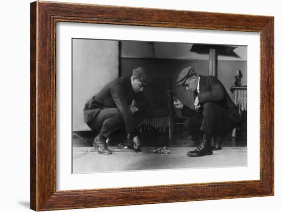 Two Gamblers Throw Craps for Money with Dollars on Floor-null-Framed Art Print